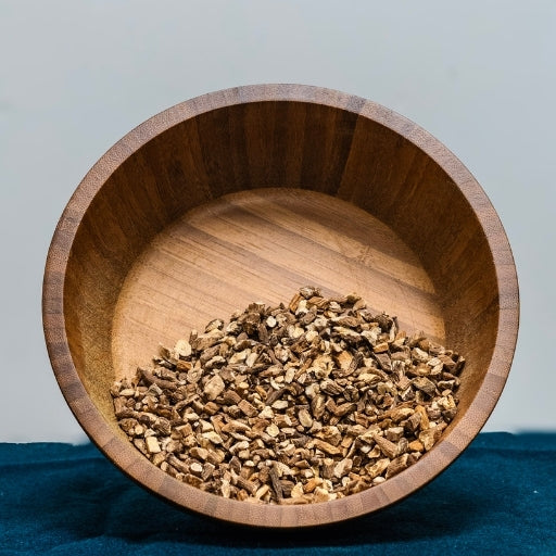 Dandelion Root (Taraxacum Officinale) dried chopped root in wooden bowl
