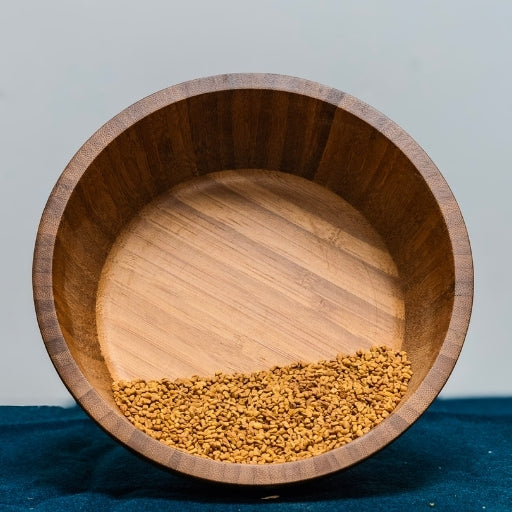 Fenugreek Seeds (Trigonella Foenum-Graecum) in wooden bowl