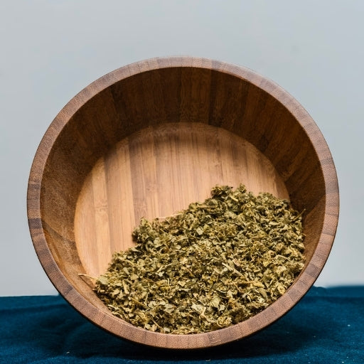 Lady's Mantle (Alchemilla Vulgaris) dried herb in wooden bowl