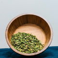 Moringa Leaf (Moringa Oleifera) dried herb in wooden bowl