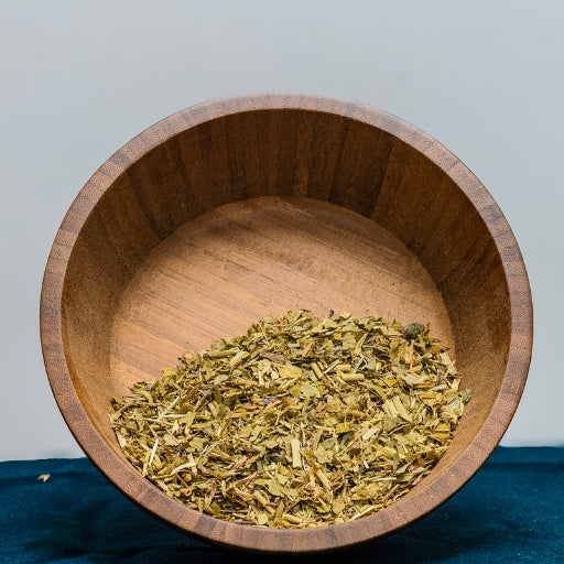 Passionflower (Passiflora Incarnata) dried herb in wooden bowl