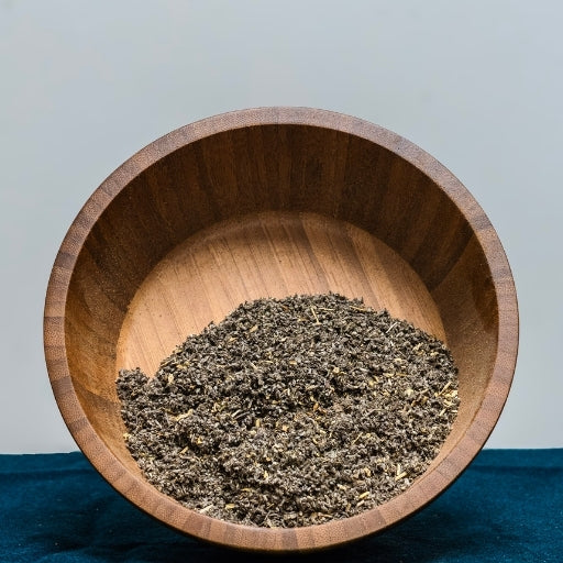 Rubbed Sage (Salvia Officinalis) dried herb in wooden bowl
